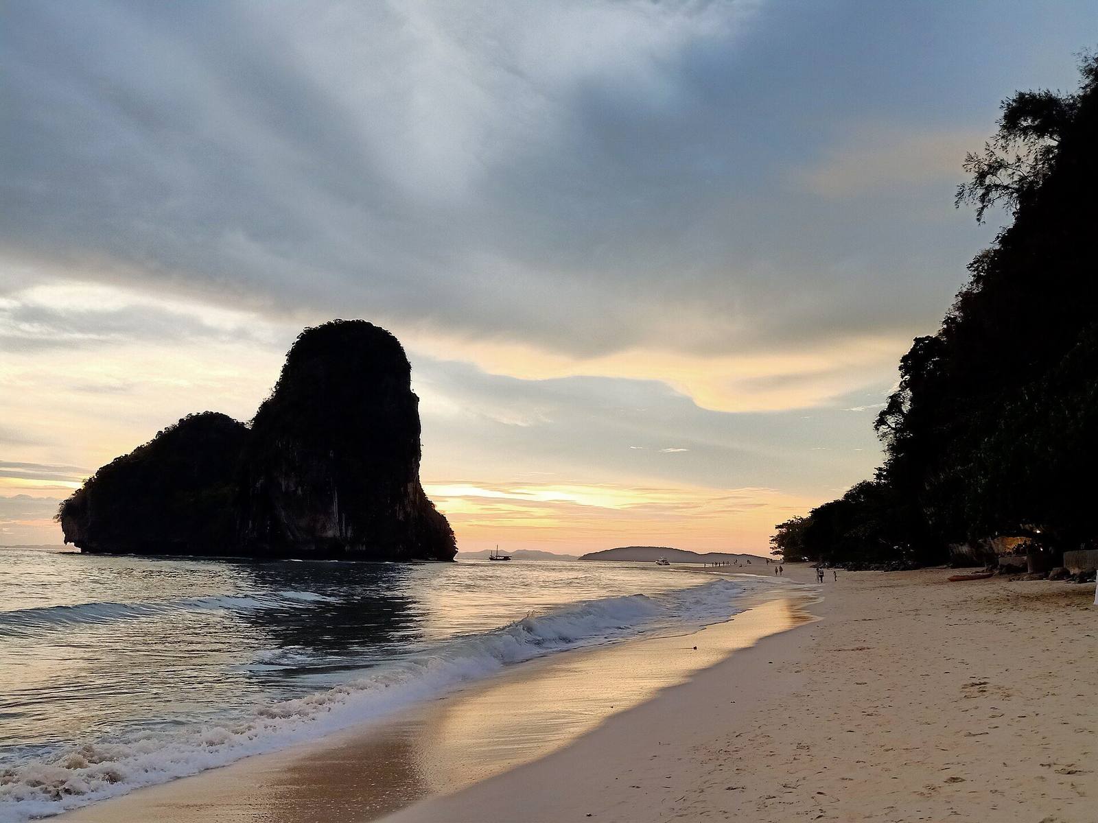 Sunset over the limestone island at Phra Nang Cave Beach